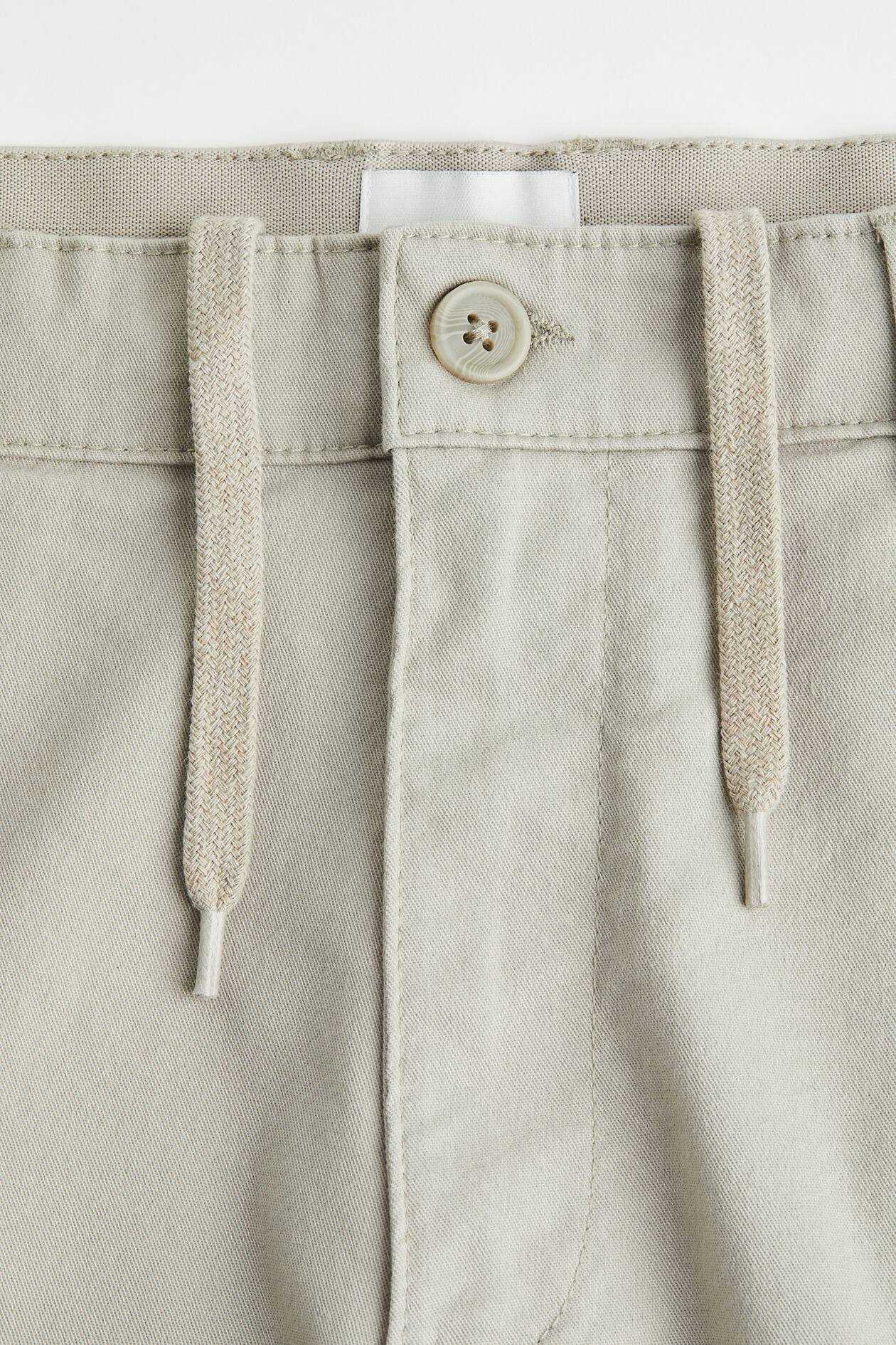 شلوارک کتان پسرانه 31537 سایز 8 تا 15 سال مارک H&M