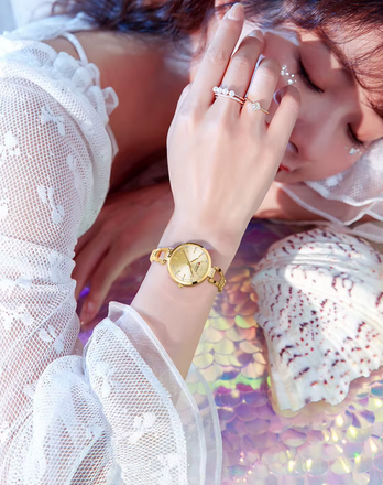 ساعت مچی زنانه برند CURREN 9092 کد 2297